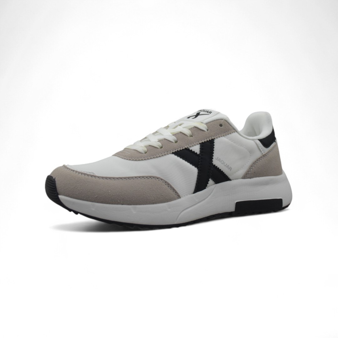 Articulo 2631<br>ZAPATILLA DEPORTIVA – JAGUAR – 40/45 <br>Color 165 BLANCO/NEGRO <br> <span class='titulo_secundario' style='background-color:white;color:black;margin-top:7px; margin-bottom:0px;font-size:20px;'>Precio del Par</span>